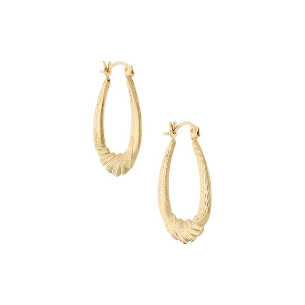 Arracadas labradas en oro amarillo 14 kilates.