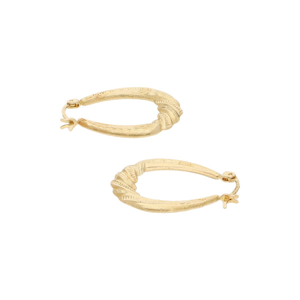 Arracadas labradas en oro amarillo 14 kilates.