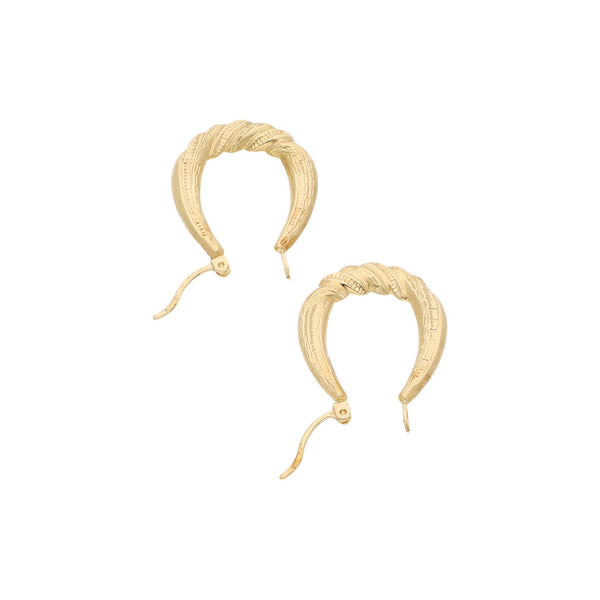 Arracadas labradas en oro amarillo 14 kilates.
