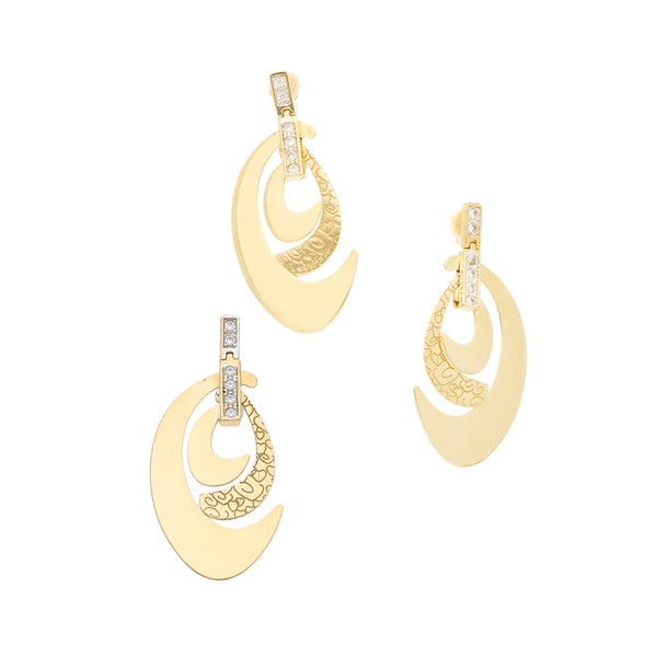 Juego de aretes y dije laminados con sintéticos en oro amarillo 14 kilates.