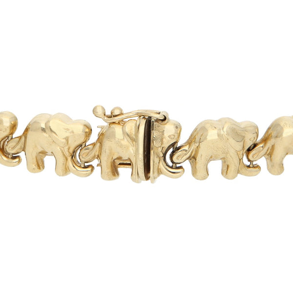 Pulsera eslabón hueco motivo elefante en oro amarillo 14 kilates.