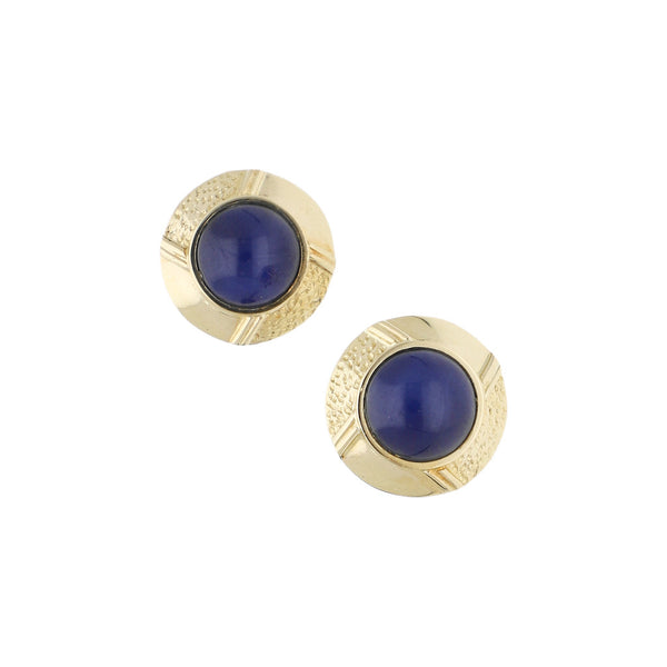 Aretes diseño especial con zafiro estrella en oro amarillo 14 kilates.