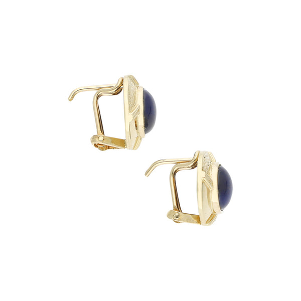 Aretes diseño especial con zafiro estrella en oro amarillo 14 kilates.