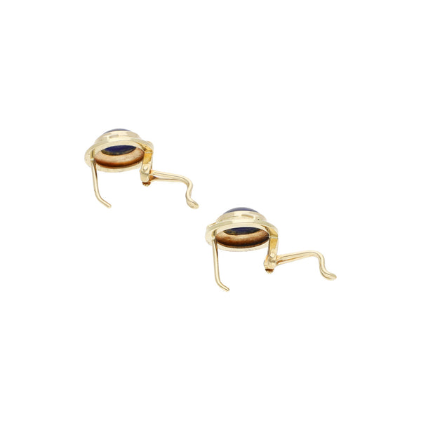 Aretes diseño especial con zafiro estrella en oro amarillo 14 kilates.