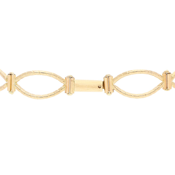 Pulsera eslabón articulado en oro amarillo 14 kilates.