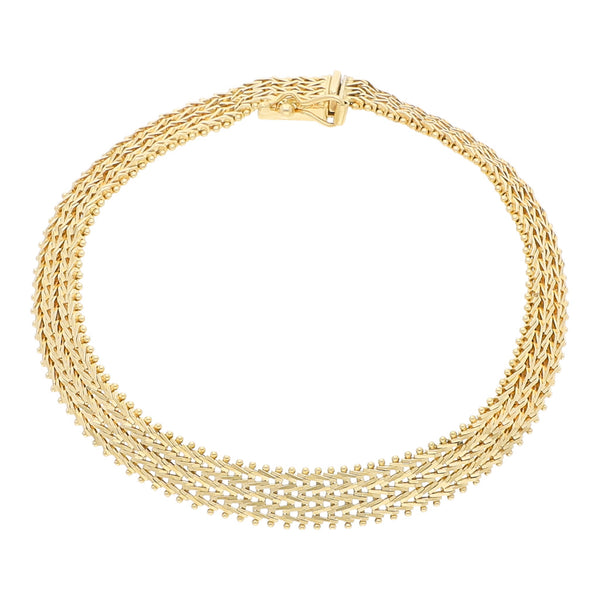 Pulsera eslabón boleado en oro amarillo 14 kilates.