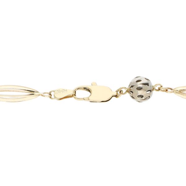 Pulsera eslabón calado en oro tres tonos 14 kilates.