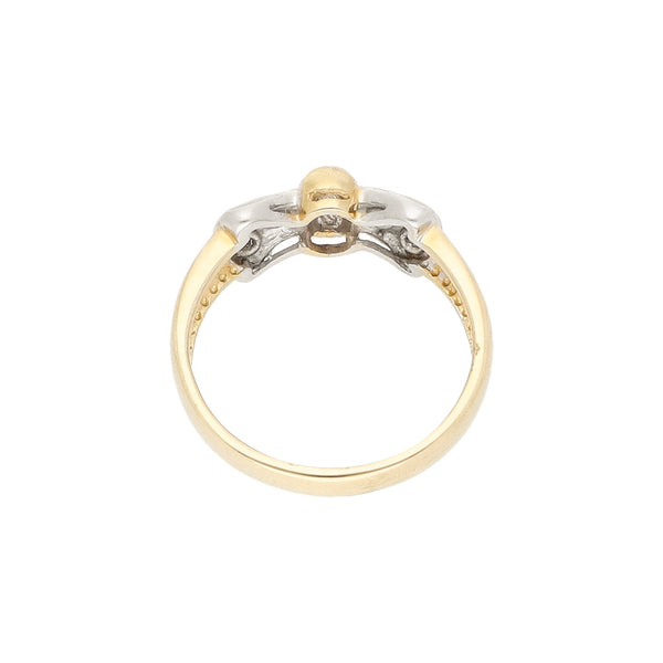 Anillo diseño especial con diamantes motivo moño en oro amarillo 14 kilates.