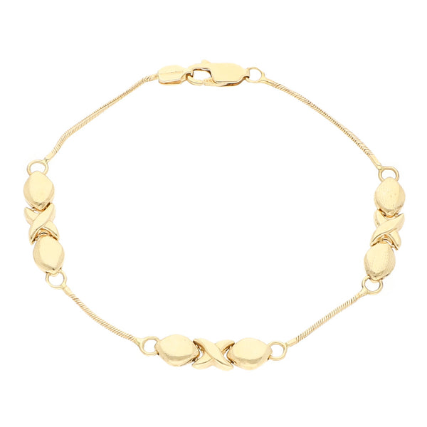 Pulsera eslabón combinado en oro amarillo 14 kilates.