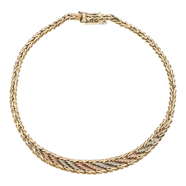 Pulsera eslabón boleado en oro tres tonos 14 kilates.