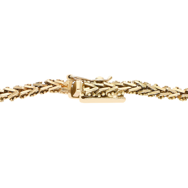 Pulsera eslabón boleado en oro tres tonos 14 kilates.