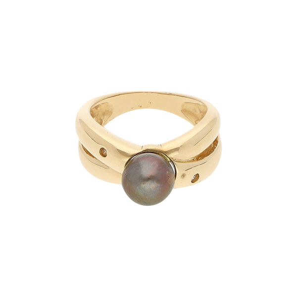 Anillo diseño especial con perla y sintéticos en oro amarillo 14 kilates.