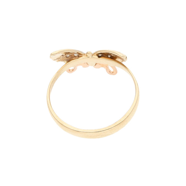 Anillo diseño especial con circonias motivo mariposa en oro dos tonos 14 kilates.