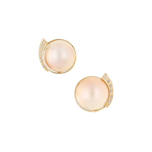 Aretes diseño especial con diamantes y perlas en oro amarillo 14 kilates.