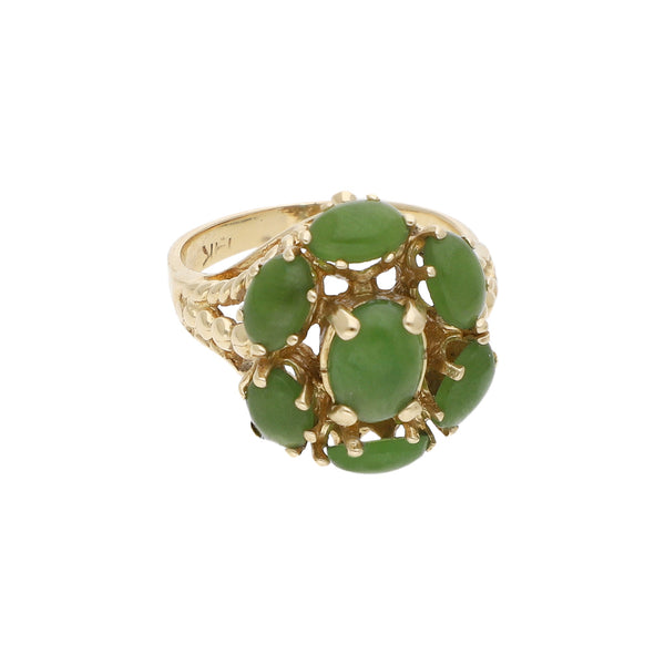 Anillo diseño especial con sintéticos en oro amarillo 14 kilates.