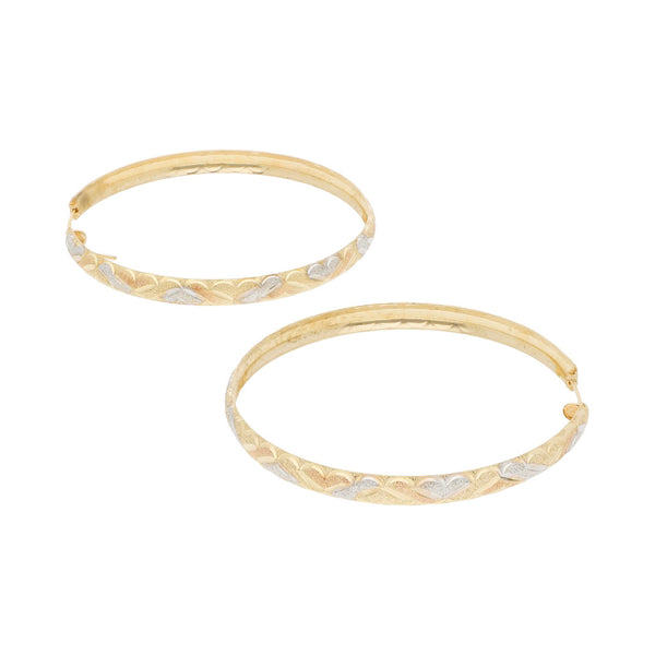 Arracadas facetadas en oro amarillo 14 kilates.