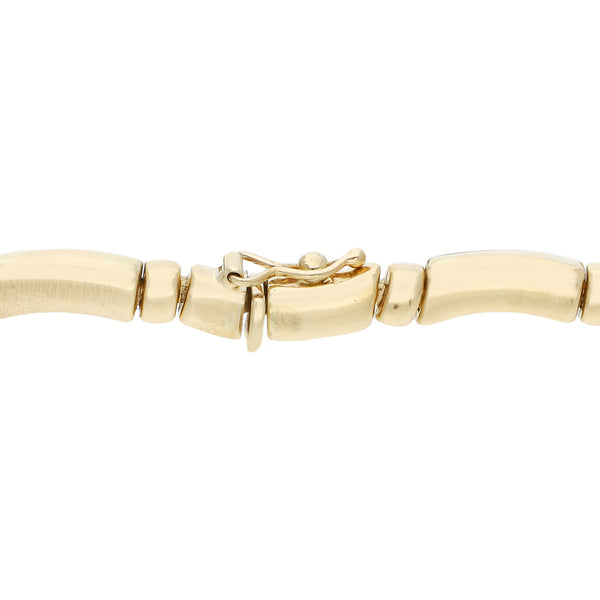 Pulsera eslabón articulado en oro amarillo 14 kilates.