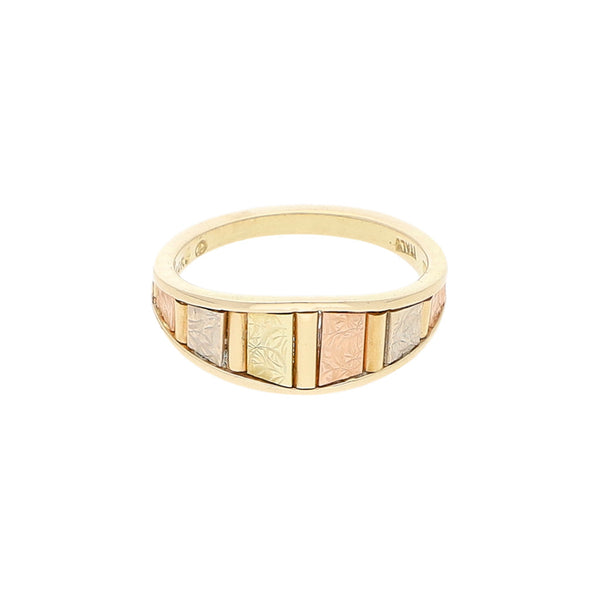 Anillo labrado en oro tres tonos 14 kilates.