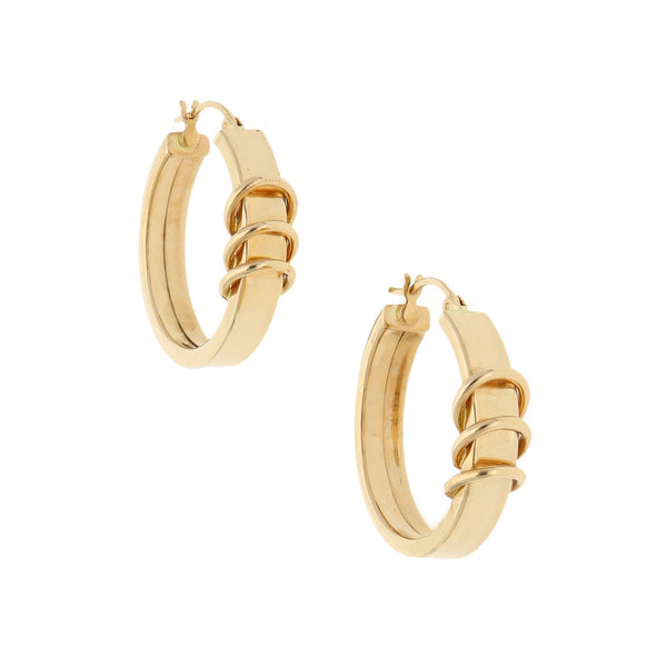 Arracadas huecas en oro amarillo 14 kilates.