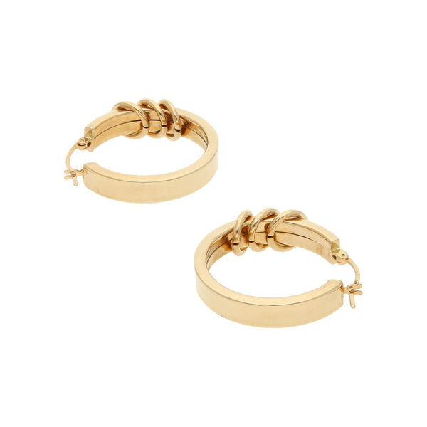 Arracadas huecas en oro amarillo 14 kilates.