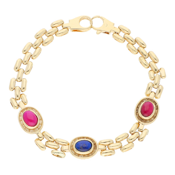 Pulsera eslabón articulado con aplicaciones de sintéticos en oro amarillo 14 kilates.