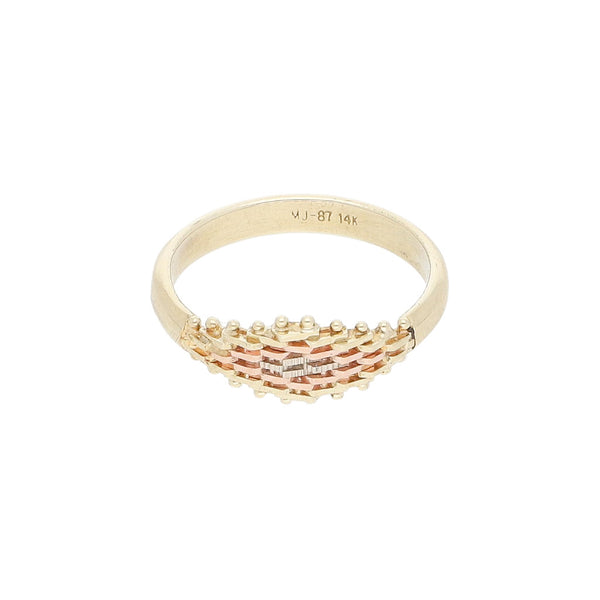 Anillo boleado en oro tres tonos 14 kilates.