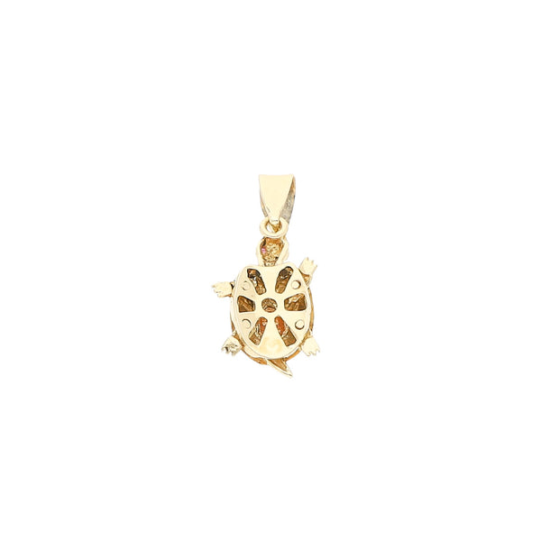 Dije diseño especial con rubíes motivo tortuga en oro dos tonos 14 kilates.