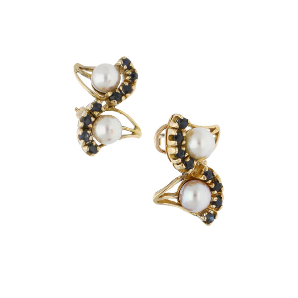 Aretes diseño especial con zafiros y perlas en oro amarillo 14 kilates.