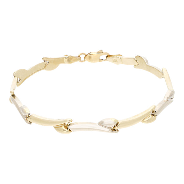 Pulsera eslabón hueco en oro dos tonos 14 kilates.