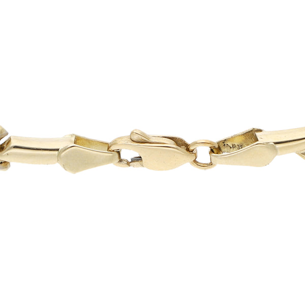 Pulsera eslabón hueco en oro dos tonos 14 kilates.