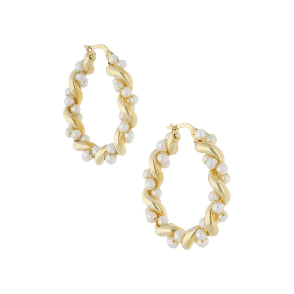 Arracadas torzales con perlas en oro amarillo 14 kilates.