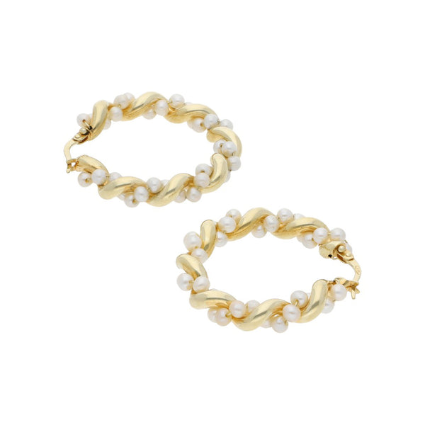 Arracadas torzales con perlas en oro amarillo 14 kilates.