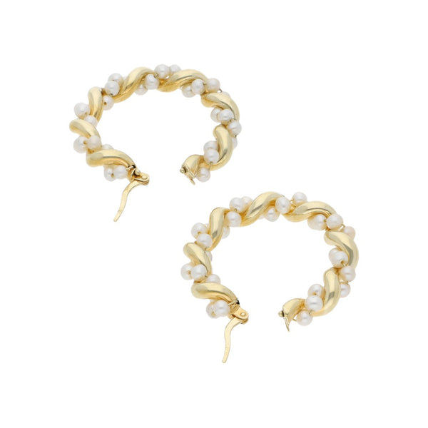 Arracadas torzales con perlas en oro amarillo 14 kilates.