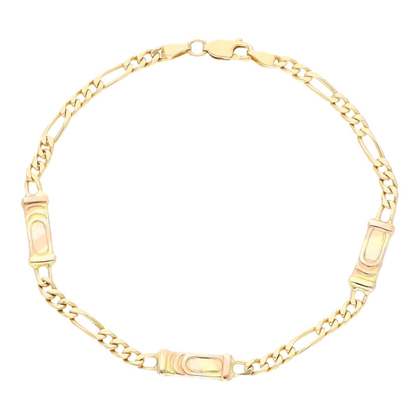 Pulsera eslabón de tres eslabones por uno con aplicaciones en oro amarillo 14 kilates.