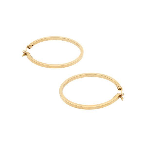 Arracadas huecas en oro amarillo 14 kilates.