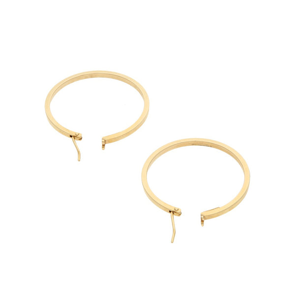 Arracadas huecas en oro amarillo 14 kilates.