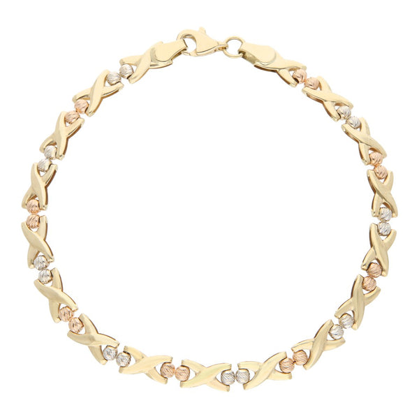 Pulsera eslabón laminado con aplicaciones en oro tres tonos 14 kilates.
