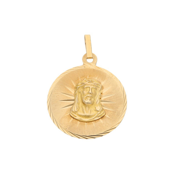 Medalla labrada motivo Divino Rostro en oro amarillo 14 kilates.