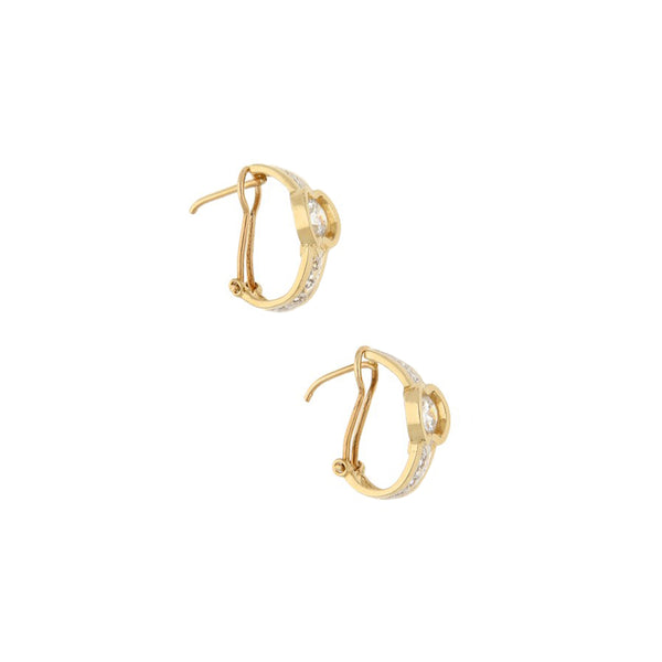 Aretes diseño especial con sintéticos en oro amarillo 14 kilates.