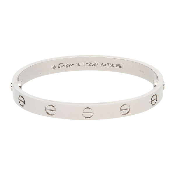 Pulsera de arillo articulada firma Cartier colección LOVE en oro blanco 18 kilates.