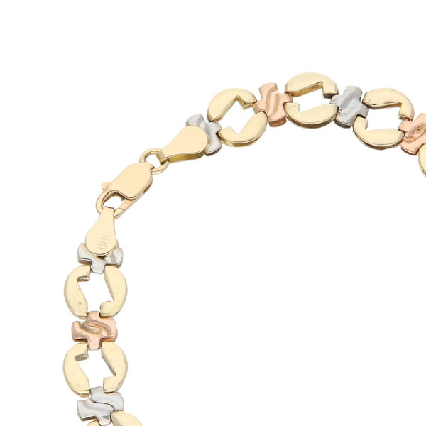 Pulsera eslabón articulado en oro tres tonos 14 kilates.