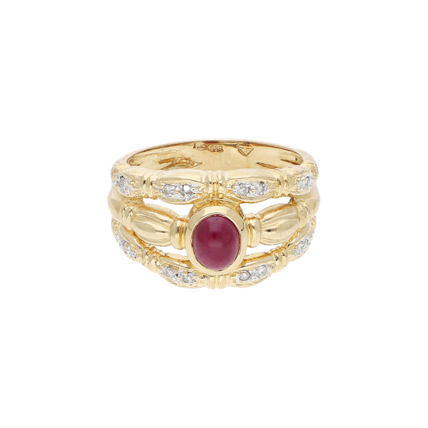 Anillo calado con diamantes o rubí en oro amarillo 14 kilates.
