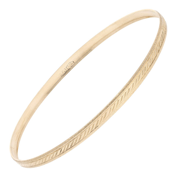 Pulsera de arillo facetado en oro amarillo 14 kilates.