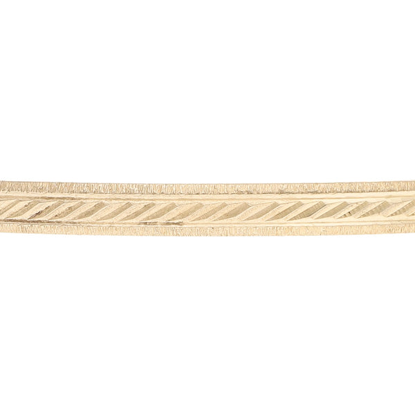 Pulsera de arillo facetado en oro amarillo 14 kilates.