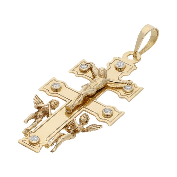 Crucifijo diseño especial con diamantes en oro amarillo 18 kilates.