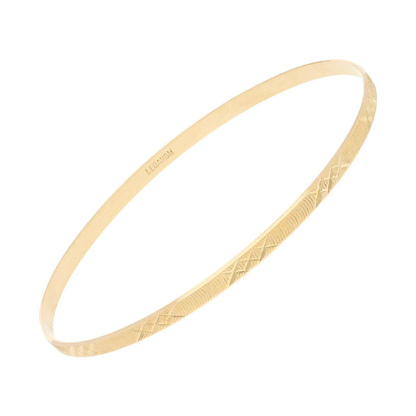 Pulsera de arillo facetada en oro amarillo 14 kilates.