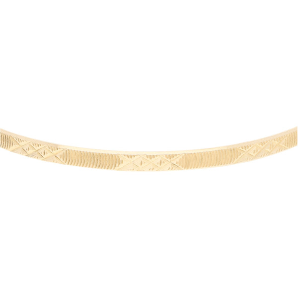 Pulsera de arillo facetada en oro amarillo 14 kilates.
