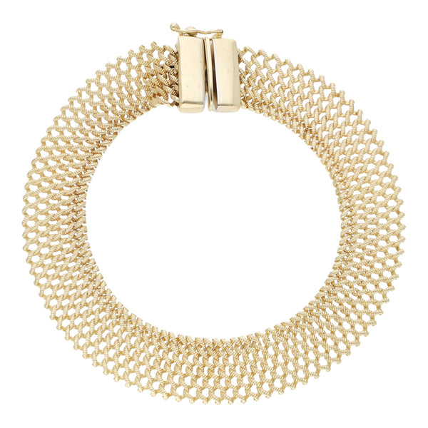 Pulsera eslabón tejido en oro amarillo 14 kilates.