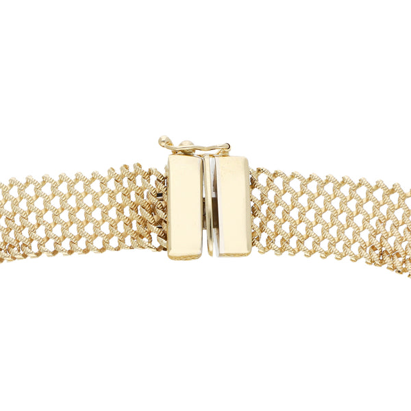 Pulsera eslabón tejido en oro amarillo 14 kilates.