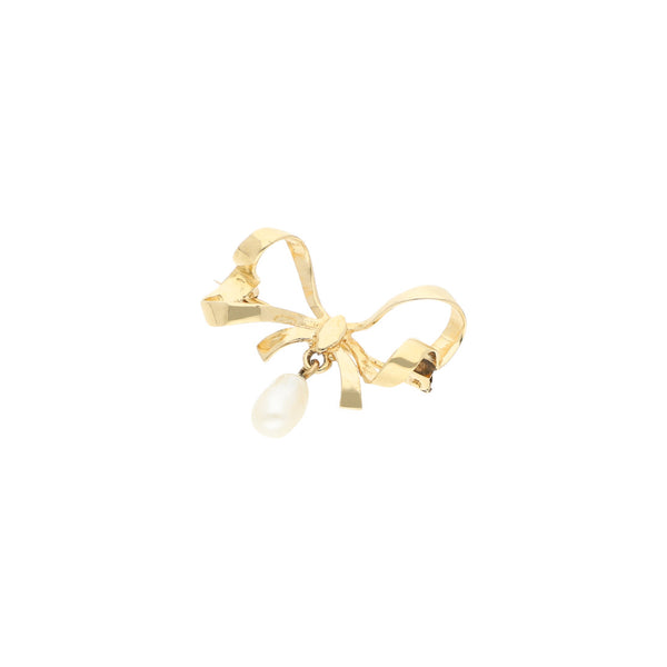 Prendedor diseño especial con perla motivo moño en oro amarillo 14 kilates.